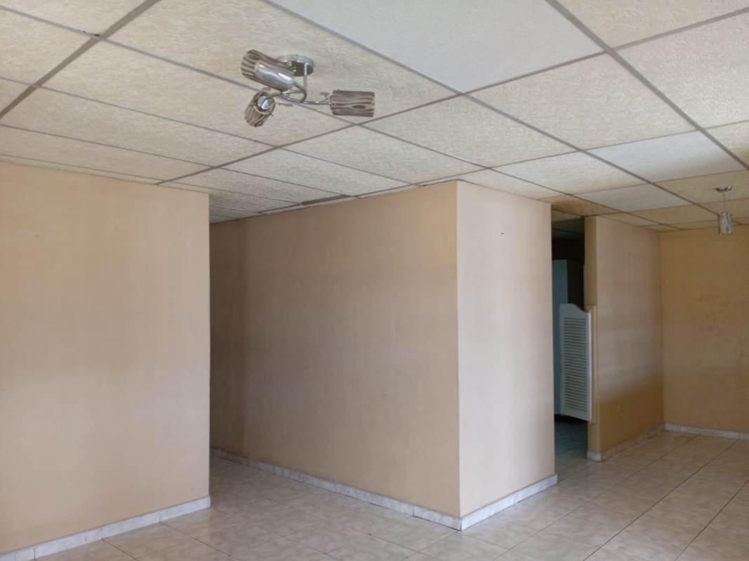 Covered parking and front terrace area with metal security bars Urbanización Don Bosco Panama