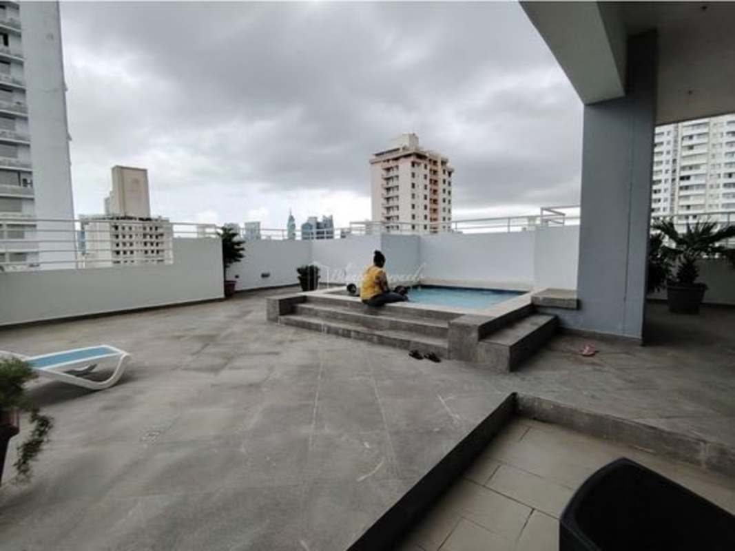 Rooftop terrace with pool overlooking city skyline in PH Windows apartment Panama