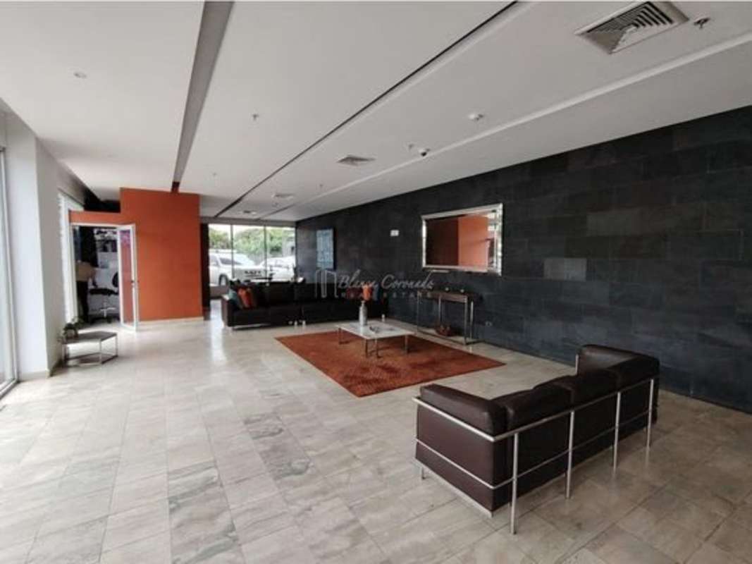 Modern lobby with black leather sofas and bright design PH Windows Panama