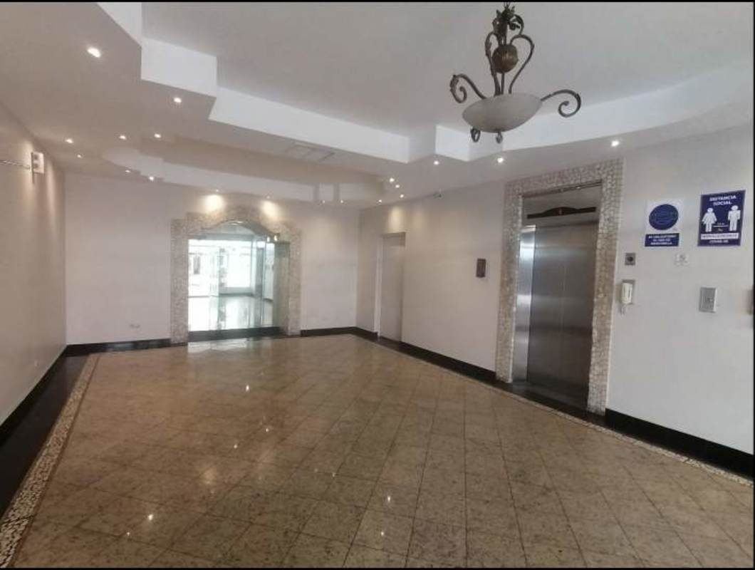Lobby with chandelier and elevator access in PH Camino de Cruces El Dorado Panama