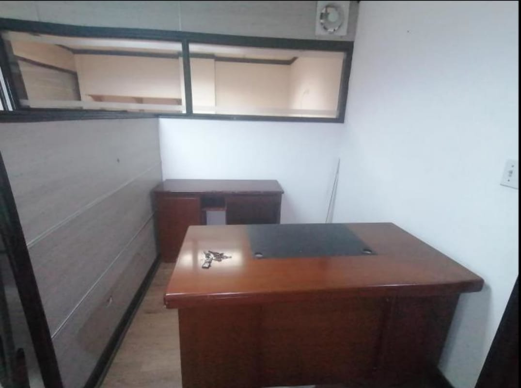 Private office room with glass partitions and laminate floors in PH Camino de Cruces El Dorado