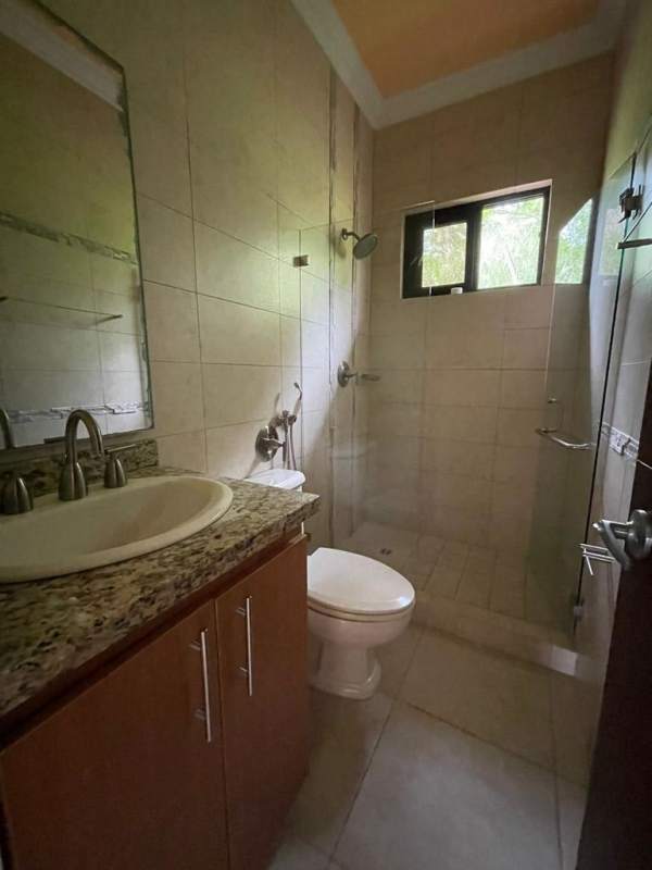 Contemporary bathroom with granite vanity glass shower Embassy Club Panama