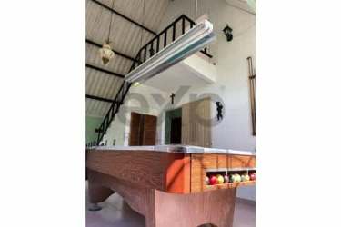 Rustic style recreation room with pool table and loft in Spanish villa on Gatun lake Panama