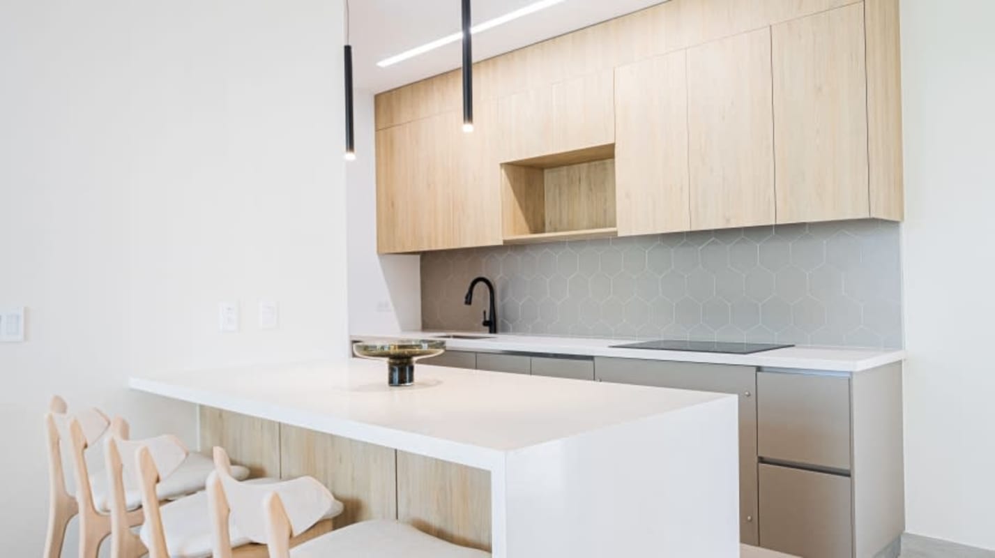 Bright modern living area at PH Nogal Costa del Este with minimalist design and decor