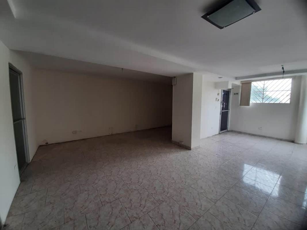 Vacant commercial unit interior with tiled floors, large window Parque Lefevre Panama City