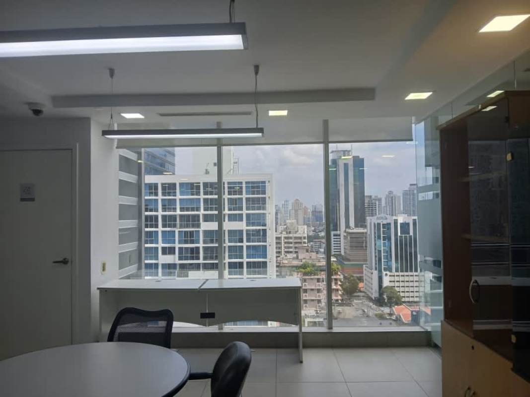 Private executive office with glass walls and stunning skyline outside PH SL-55 Obarrio Panama