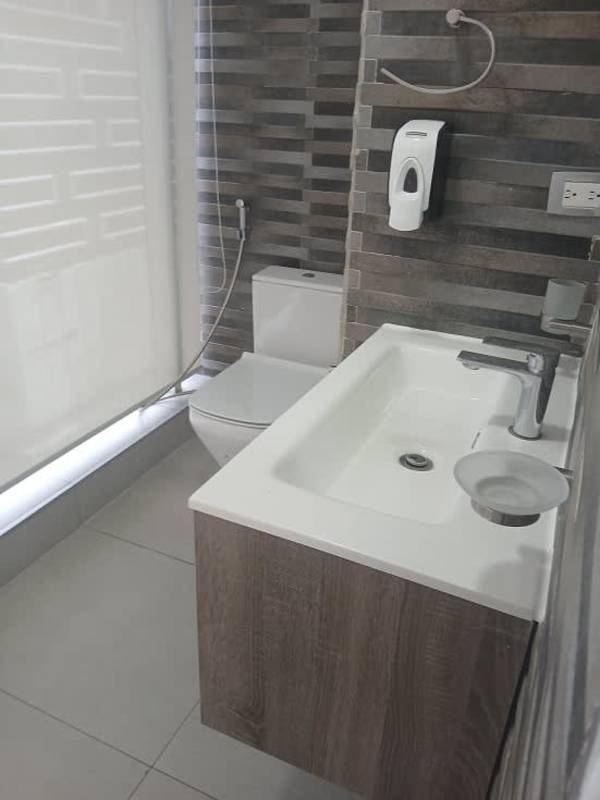 Cafeteria area with granite counters, bar stools, and skyline panorama PH SL-55 Obarrio Panama