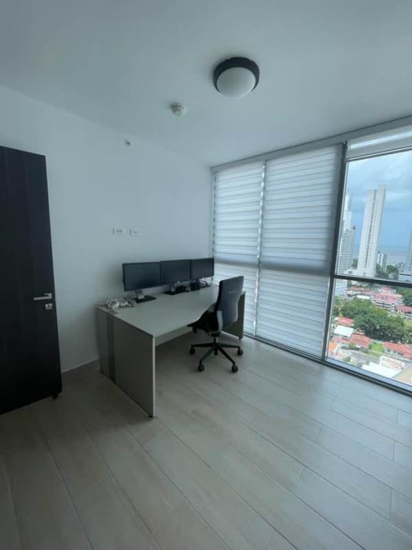 Spacious living room with large windows, balcony access, ocean view at PH Vita Coco del Mar Panama