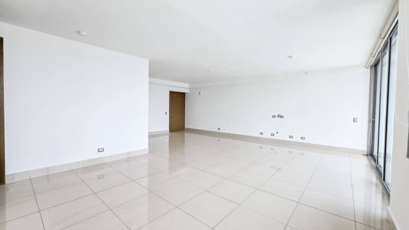 Balcony with Pacific Ocean and city views in luxury condo PH Costa del Este Park Panama