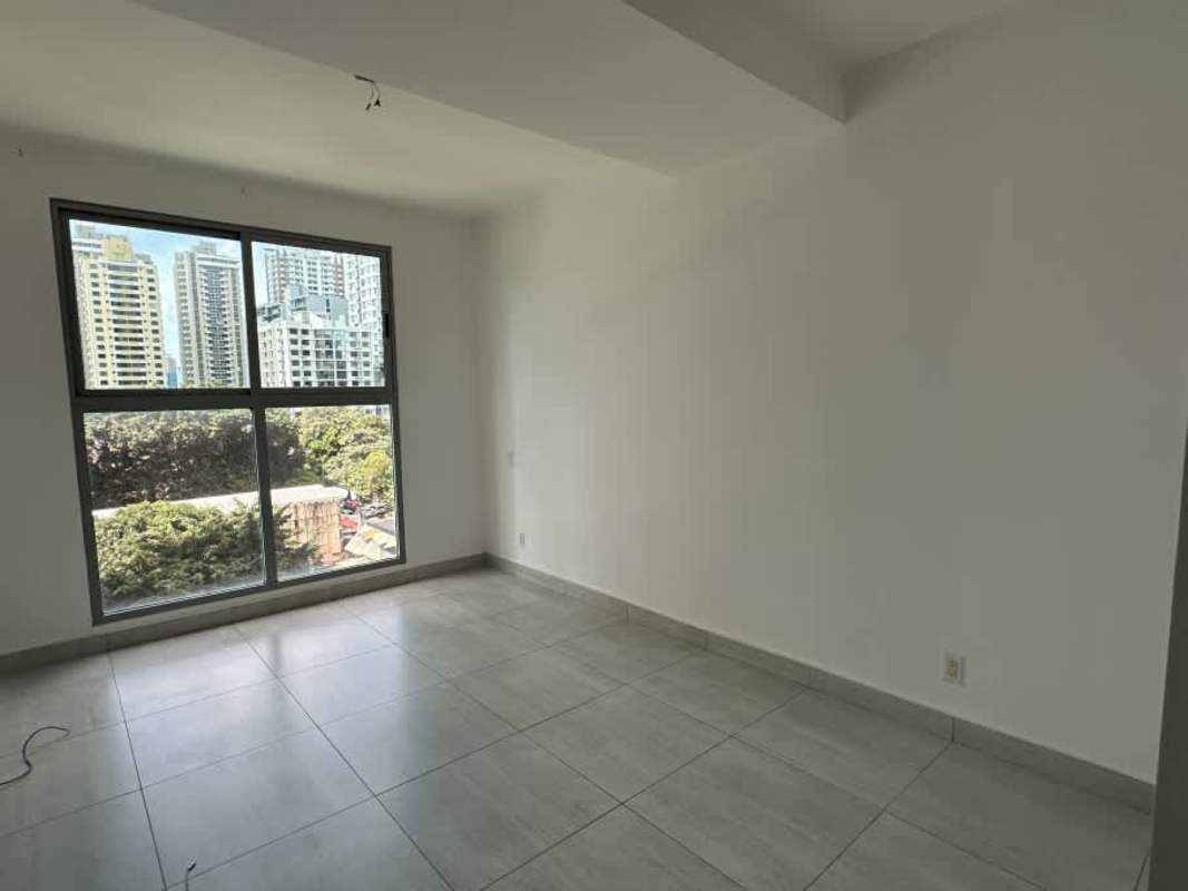 Empty bedroom with large window and city views PH Astre Haus San Francisco Panama