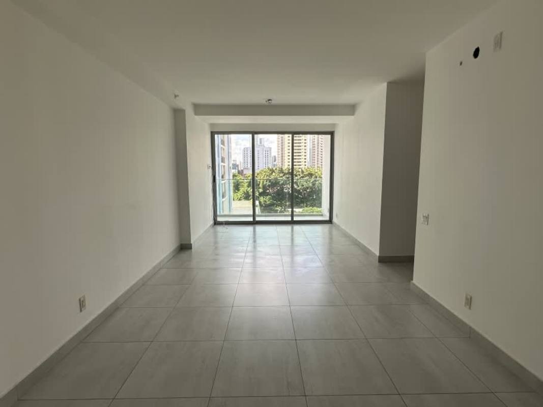 Modern bedroom with large windows offering urban views at PH Astre Haus San Francisco Panama