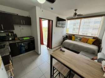 Bright furnished living and dining studio with AC and tile floors near the beach in Playa Corona Panama