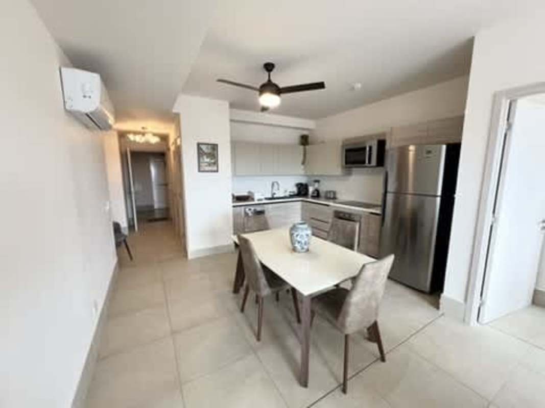 Contemporary kitchen with quartz counters, stainless appliances in Santa Maria Golf Panama