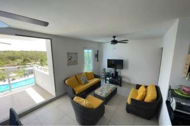 Master bedroom with windows, tile floors, closet at Playa Blanca condo Coclé Panama