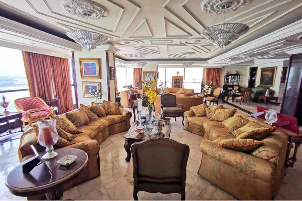 Penthouse kitchen with island, marble countertops and high-end appliances at Pacific Point Tower Panama