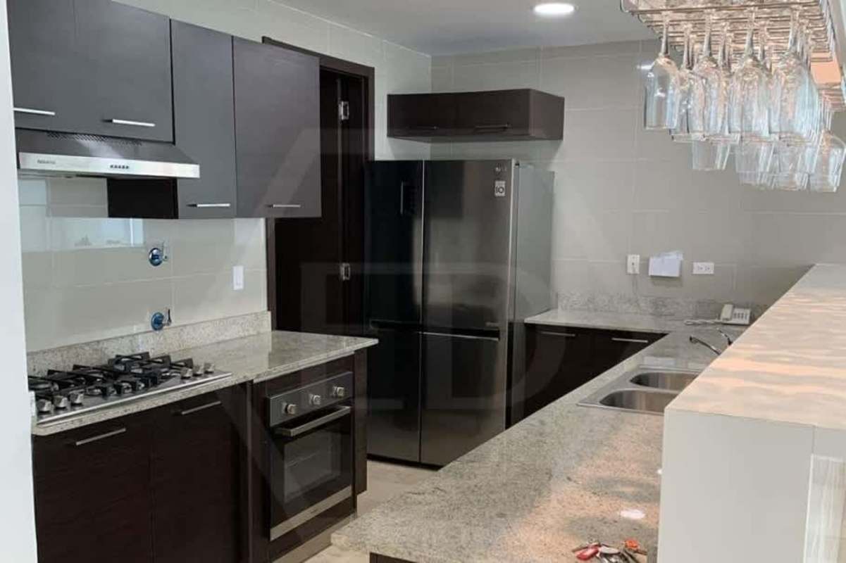 Fully equipped modern kitchen with granite countertops and stainless appliances Grand Tower Panama