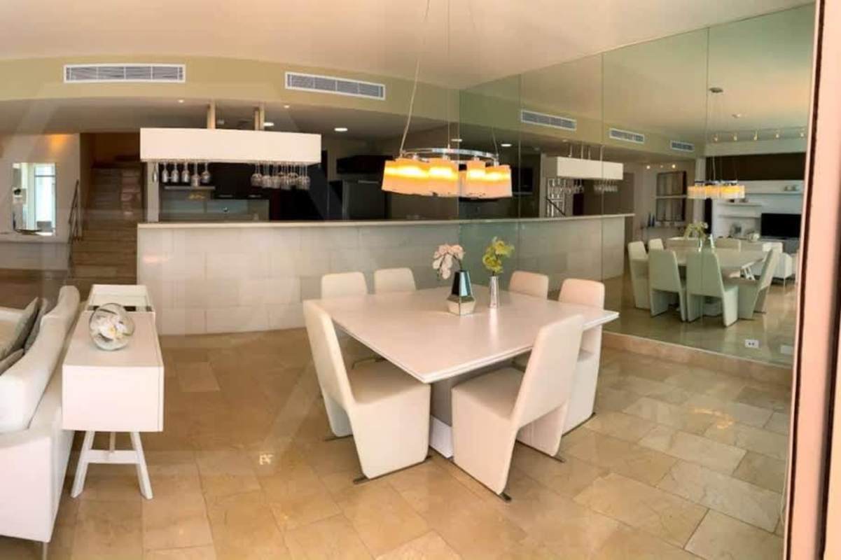 Modern dining space with large windows and ocean view Grand Tower Panama