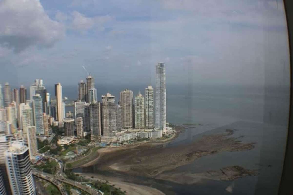 Aerial skyline with modern skyscrapers along Avenida Balboa waterfront Panama