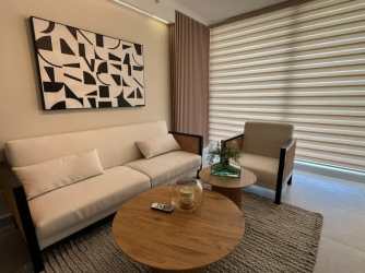 Bedroom with large window and panoramic ocean views at The Palms San Carlos Panama