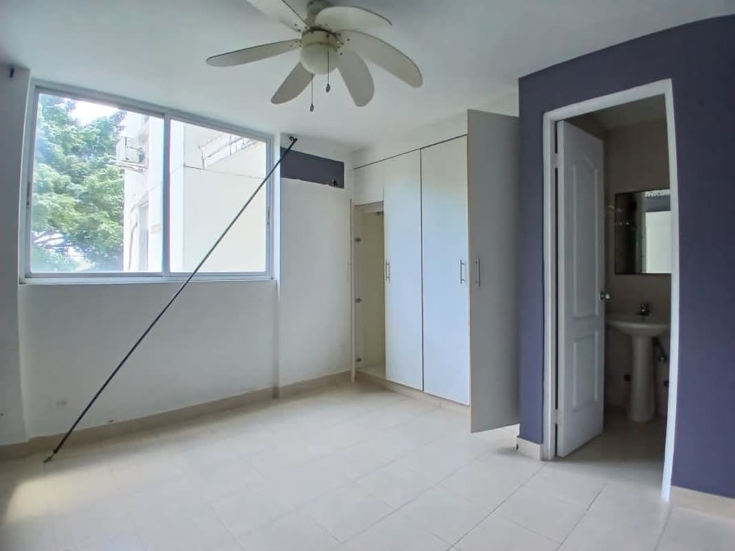 Bright master bedroom with large window, built-in wardrobe at Edison Park Panama