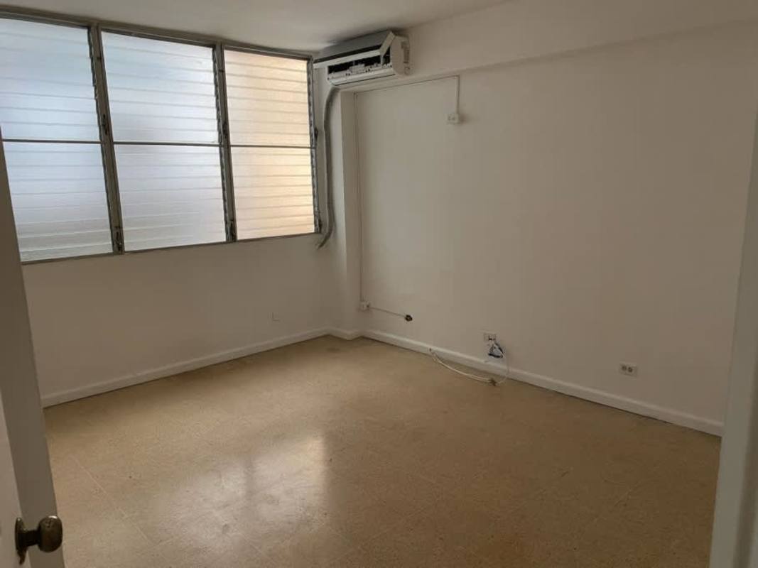 Second bedroom with window and tile floor apartment Parque Lefevre Panama