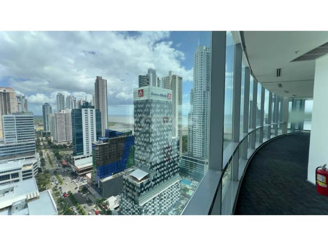 Office with floor-to-ceiling windows overlooking Pacific Ocean and Panama skyline