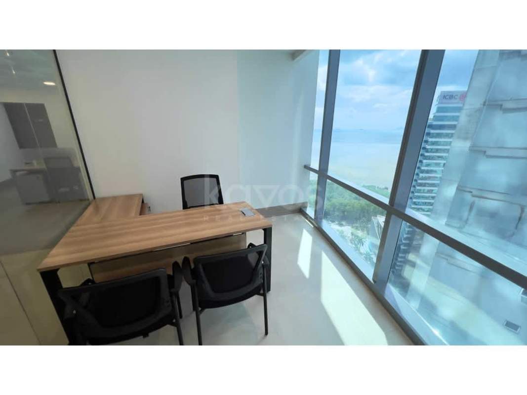 Modern shared open workspace with desks and chairs at Financial Park in Costa del Este Panama