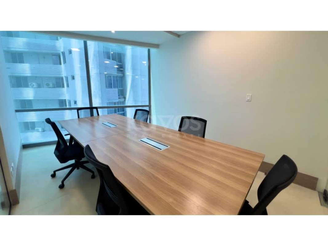 Modern conference room inside rental office in Financial Park Costa del Este with city view and large wooden table