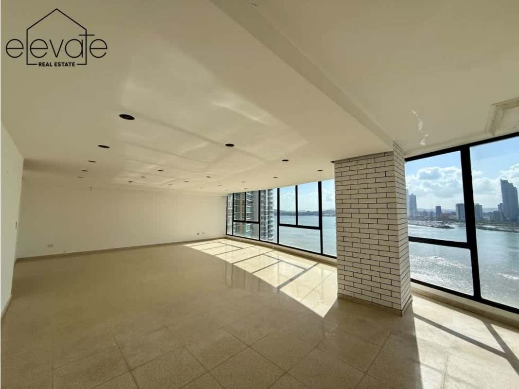 Elegant bathroom with marble countertop, glass shower at PH Mar de Plata Punta Paitilla