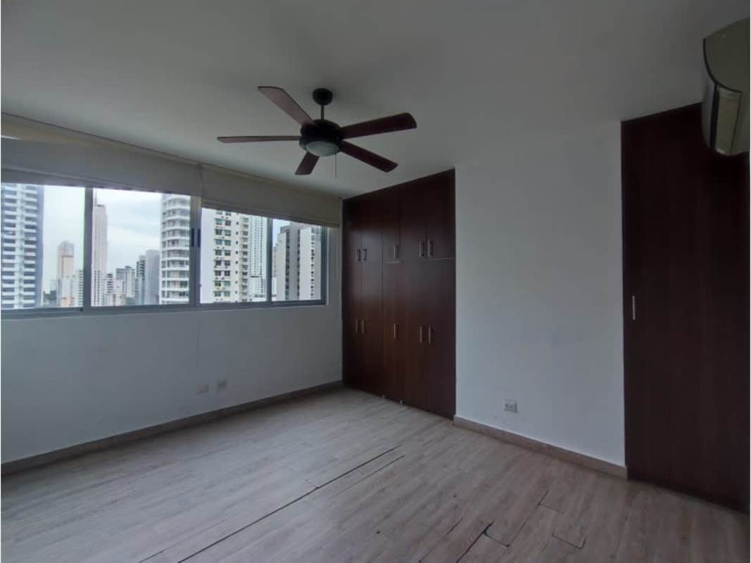 Modern spacious bedroom with large windows and built-in closets in PH Harmony San Francisco Panama