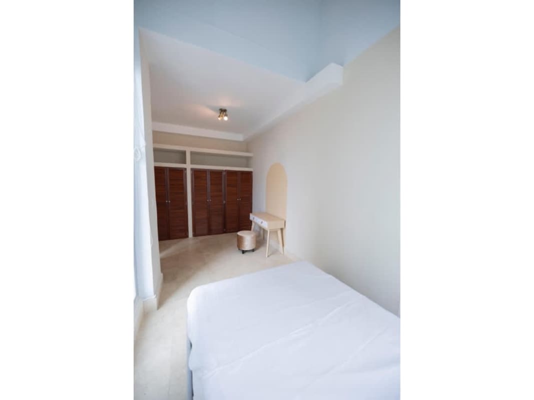 Master bedroom with natural light, wooden floors, ocean view, PH Ocean Club Punta Pacifica Panama
