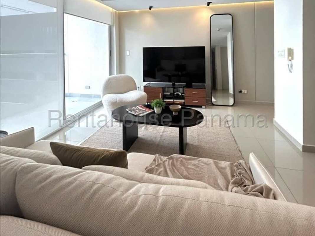 Bright living room with large windows in Costa del Este PH Pijao apartment
