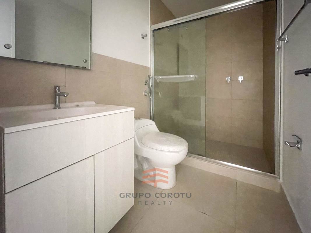 Modern bedroom with tiled floor and window natural light Costa Sur Panama