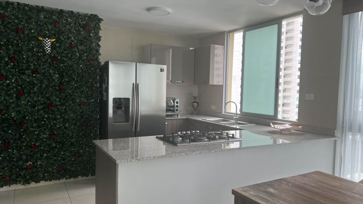 Kitchen granite island stainless appliances PH Lumiere Costa del Este Panama furnished rental