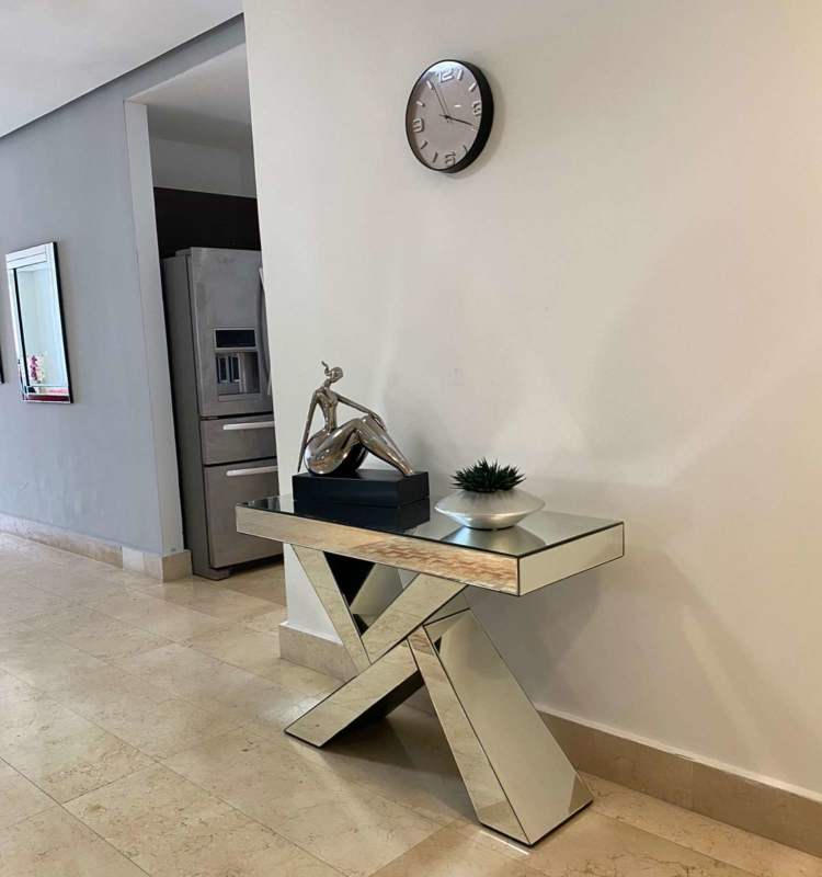 Bright living room with floor-to-ceiling windows and ocean view balcony at PH BICSA Financial Center Panama