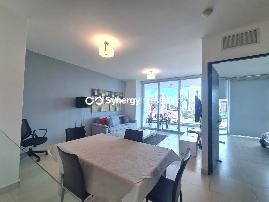 Living dining room with skyline bay views in PH BICSA Panama Avenida Balboa