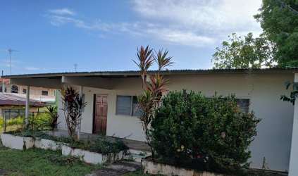 Affordable house with front porch garden fenced yard in San Francisco de la Montaña Panama