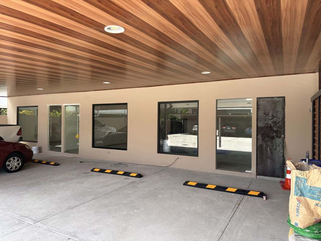 Covered carport parking at Betania Business Center commercial complex Panama City