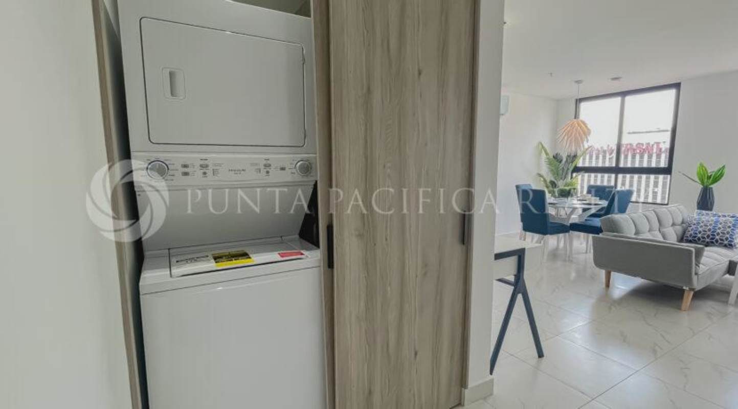 Bedroom with queen bed large window skyline view The Gray Tower Panama City