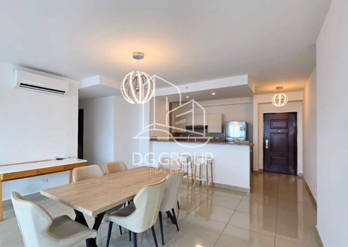 Spacious furnished living and dining room with large windows in Costa del Este apartment rental