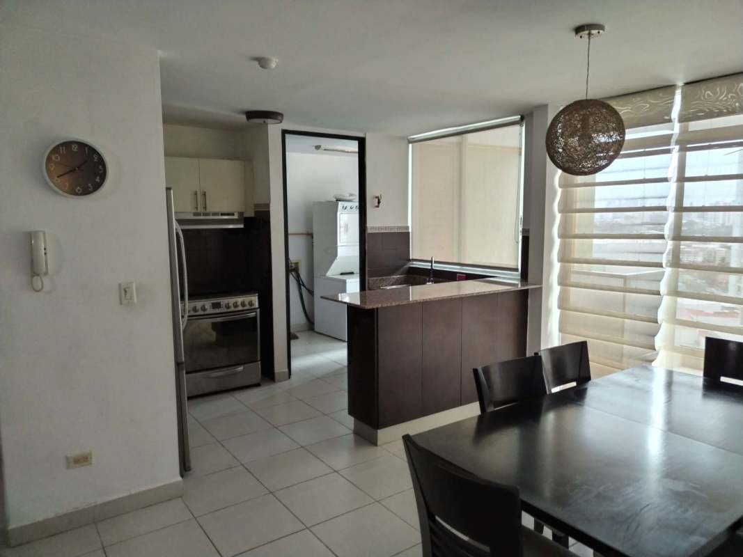 Bright master bedroom with balcony access and skyline view PH Green Bay Panama City