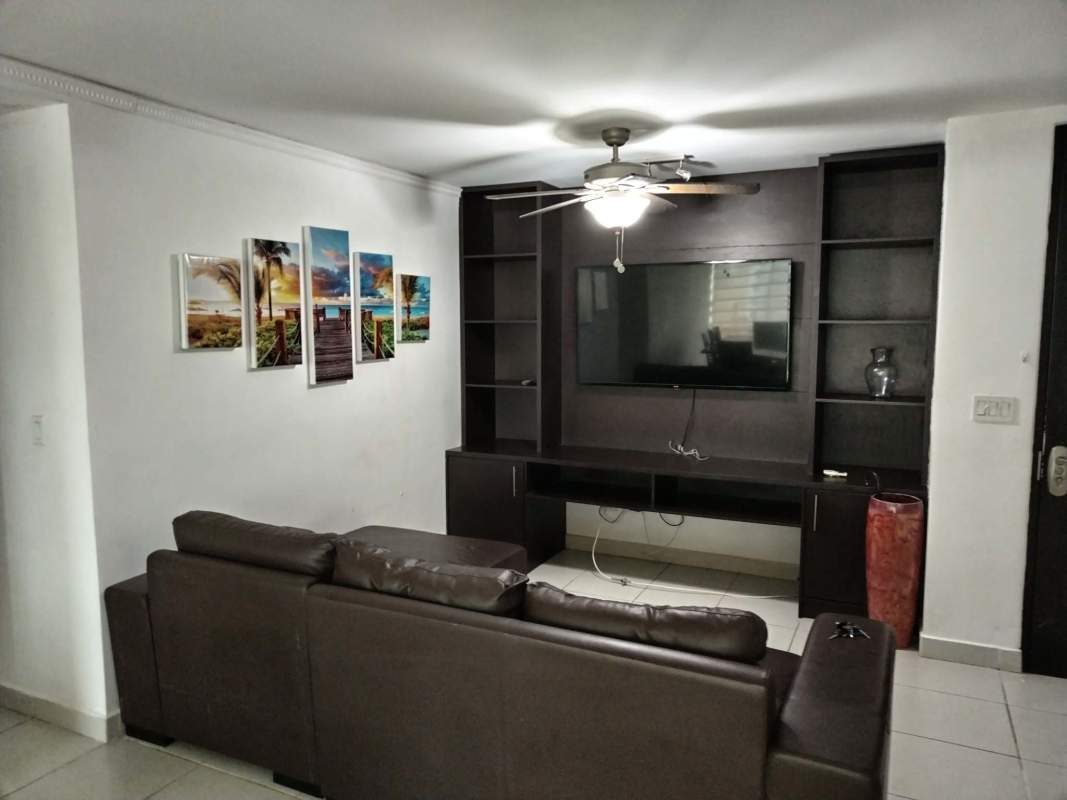 Modern kitchen with granite counters, cabinetry and window views in PH Green Bay Costa del Este Panama