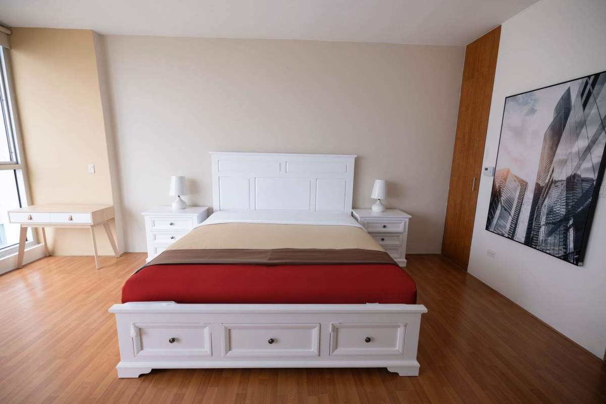 Large walk-in closet with built-in shelves and drawers in PH Loft 41 Punta Pacifica Panama