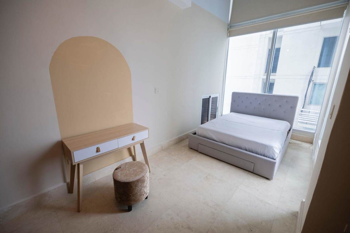 Bright minimalist bedroom with study desk in luxury PH Loft 41 Panama City for rent
