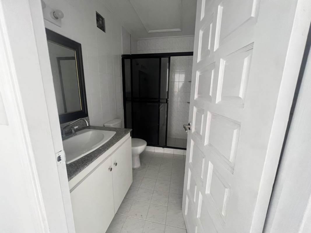 Contemporary bathroom with granite vanity, glass shower enclosure in Panama