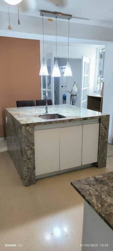 Spacious living dining area with sliding glass doors to balcony PH Del Rey El Cangrejo Panama City