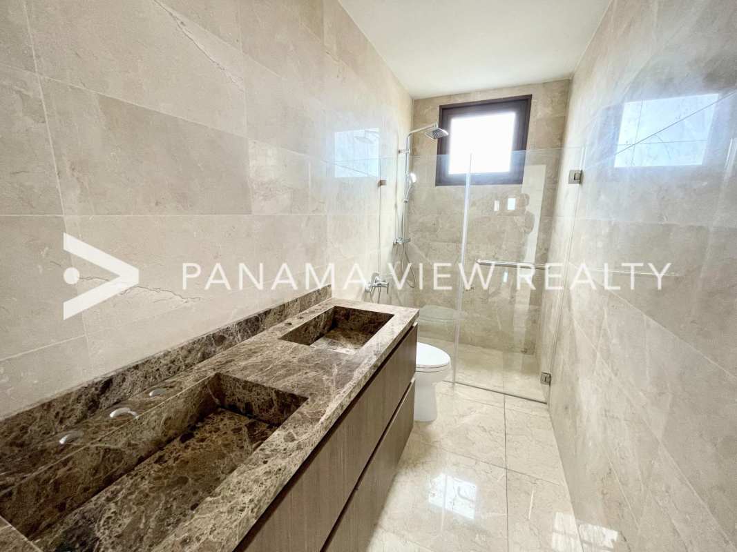 Luxury bathroom with glass shower marble tile PH The Colonial Santa María Panama