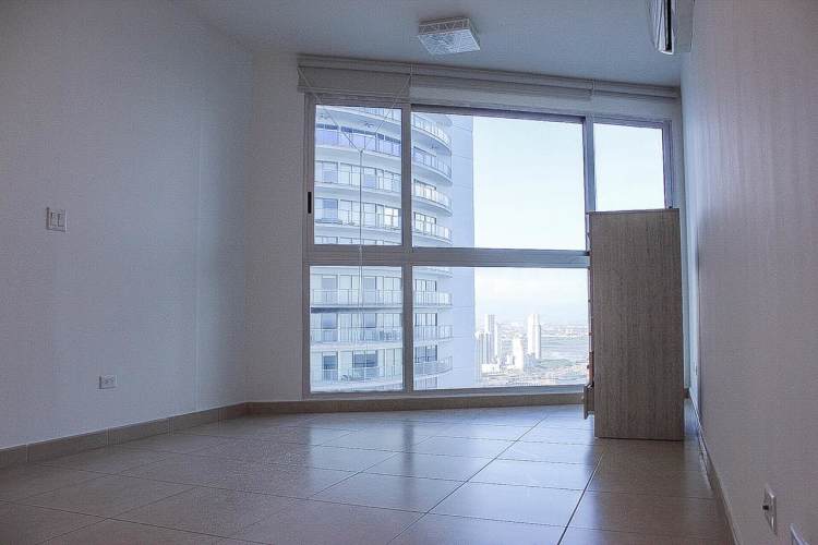 Spacious master suite with ocean frontage balcony in luxury Ocean Reef island residence Panama