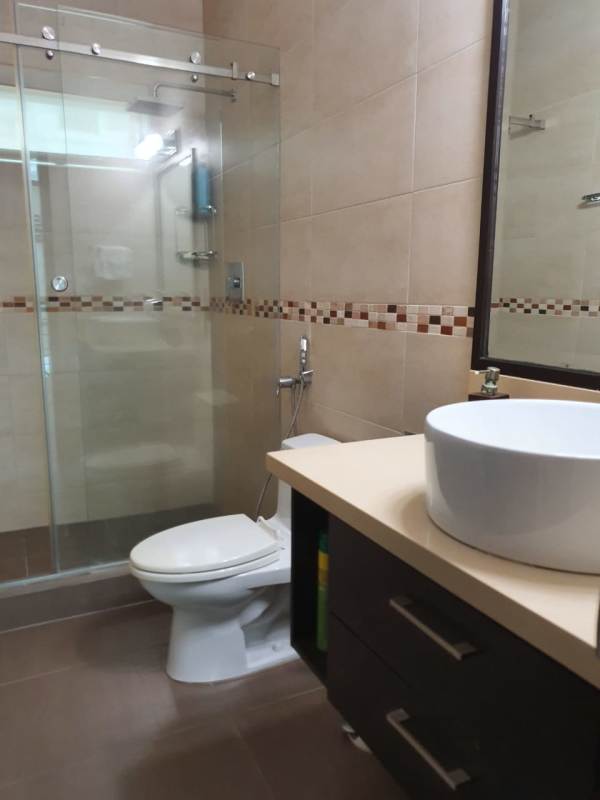 Bathroom with glass shower, soaking tub, double sinks in PH Horizonte II Panama City