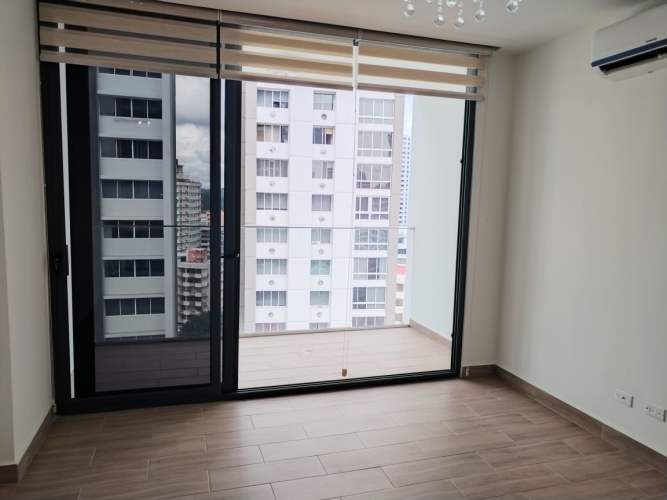 Modern living room with sliding doors and balcony PH Velure Panama